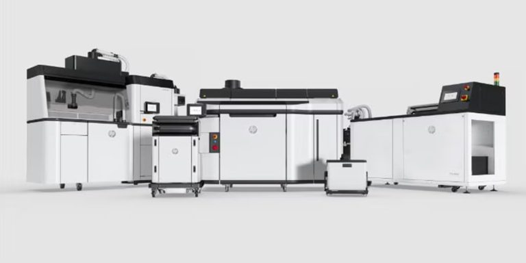 Photo of HP 3D printers to illustrate equipment used to improve yield and cut additive manufacturing costs.