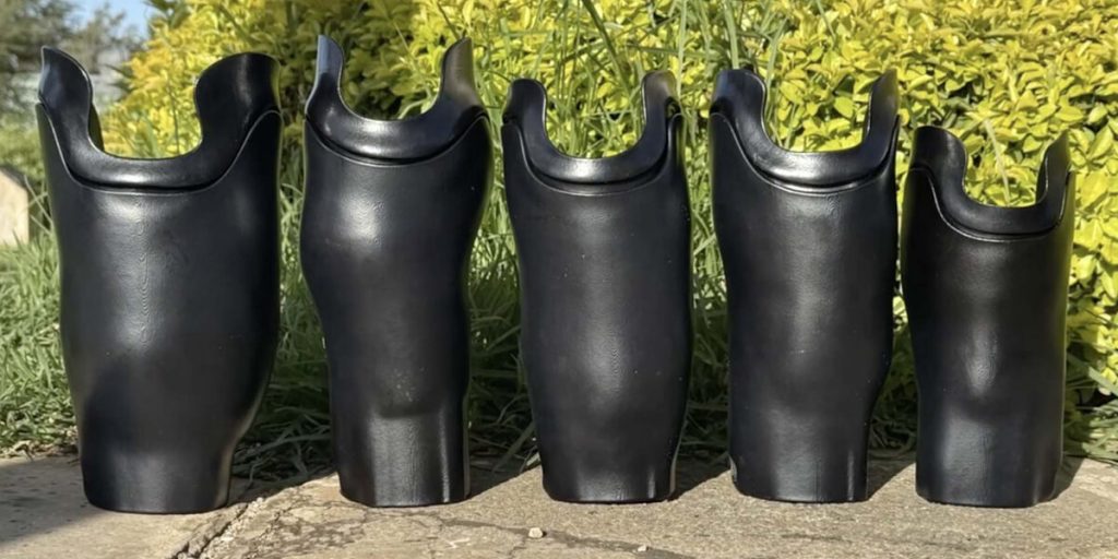 A photo of 5 prosthetics produced by ABCorp 3D printing to support Limb Kind Foundation's mission