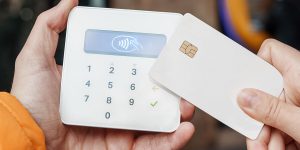 Photo of a tap-to-pay card transaction using a contactless payment chip.